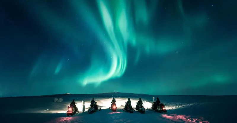 Northern Lights Snowmobile Safari and Campfire Picnic — snowmobile tour in Levi